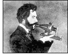 The first Alexander Bell using the first Telephone he invented.